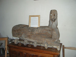 A mutilated wooden carving of an animal